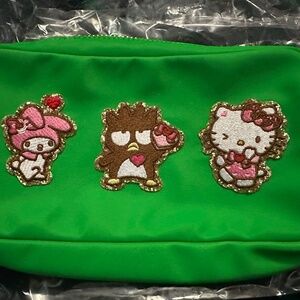 NWOT Stoney Clover small pouch in Island Hopping with 3 hello kitty patches
